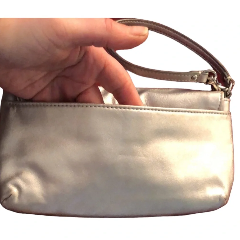 Coach  silver metallic genuine leather large wristlet or clutch 9” long  …